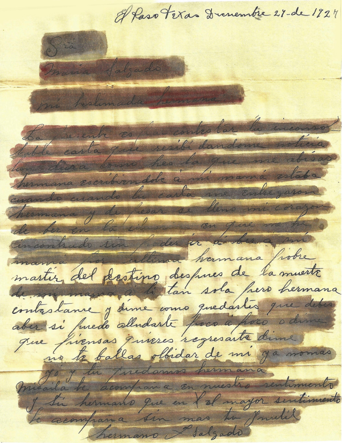 yellowed letter in Spanish with words selectively crossed out