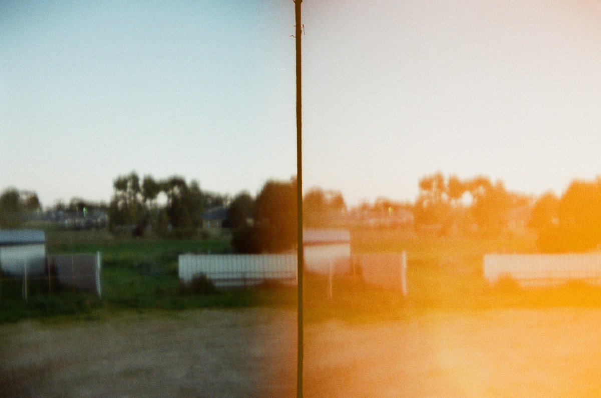 split image with blurry landscape in darker colors on the left and the same in brighter ones on the right